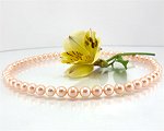 Peach pearl necklace at SelecTraders